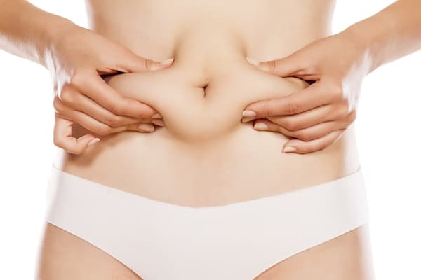 Tummy tuck vs liposuction